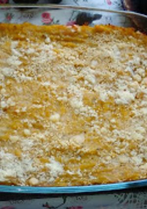 Una foto de Pastel de plátanos (machos) relleno de quesos y jamón