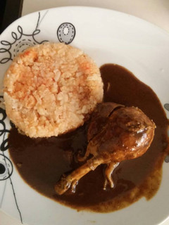 Una foto de Mole rojo con pollo
