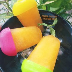 A picture of Orange popsicles.