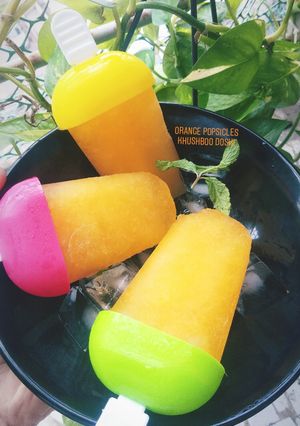 A picture of Orange popsicles.