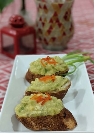 A picture of Moong and Chana Hummus on toasted bread.
