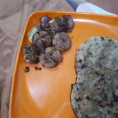 A picture of Flower onions with stuff paratha.