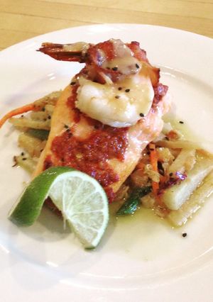 A picture of Roasted red pepper and walnut pesto salmon.