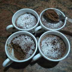 A picture of Parle biscuit mug cake (1:30 min in microwave).