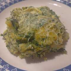 Una foto de Polenta con espinacas