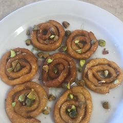 Paneer spirals(sweet dish for vrat) A picture of Paneer spirals(sweet dish for vrat).