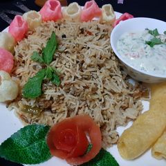 Spicy Khichri Raita and Fry paper😋😋😋 A picture of Spicy Khichri Raita and Fry paper😋😋😋.