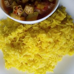 A picture of Pilau-Spiced Turmeric Fried Rice.