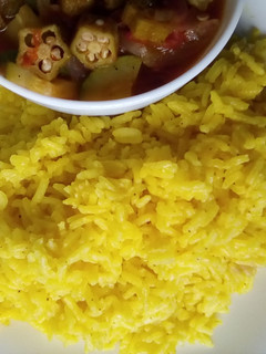 A picture of Pilau-Spiced Turmeric Fried Rice.