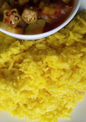 A picture of Pilau-Spiced Turmeric Fried Rice.
