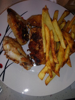 Una foto de Alitas de pollo al ajillo de la mami 😄😄
