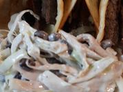 A picture of coleslaw with sour cream