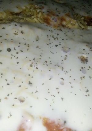 A picture of Chicken Alfredo in Tomato Sauce.