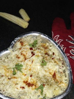 বেকড চীজি পাস্তা (baked cheesy pasta recipe in Bengali) রেসিপির প্রধান ছবি