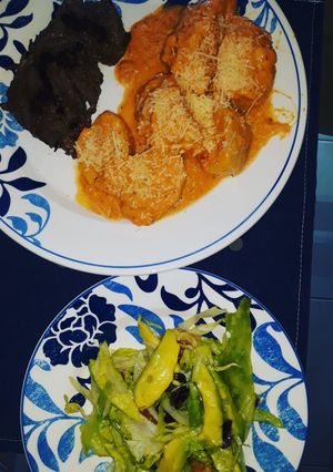 Una foto de Papas chorreadas en salsa de queso