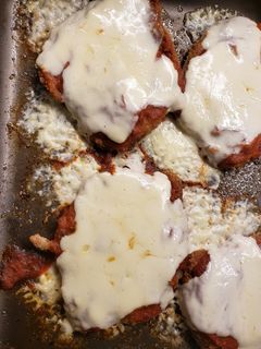 Una foto de Milanesa a la napolitana