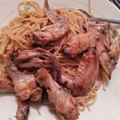 A picture of Pan fried chicken with macarroni.