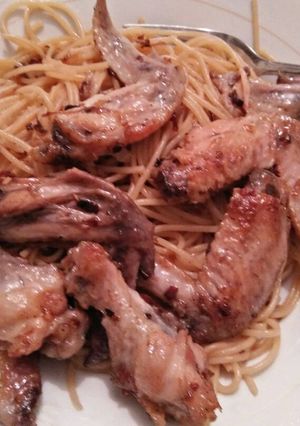 A picture of Pan fried chicken with macarroni.