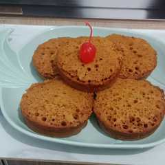 A picture of Bolu karamel anti gagal takaran sendok.