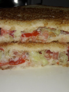 A picture of Tomato cucumber Malai sandwich.