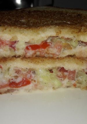 A picture of Tomato cucumber Malai sandwich.