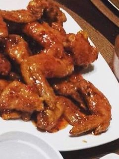 Una foto de Alitas en salsa agridulce