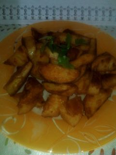 صورة لوصفة بطاطا متبلة ومحمرة في الفرن 🥔😍