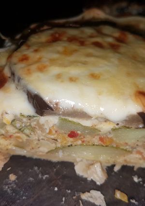 Una foto de Tarta de zucchini y berenjena😊