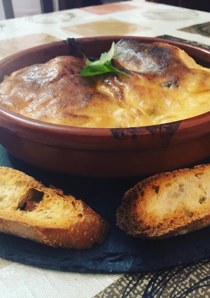 Una foto de Bacalao con al i oli