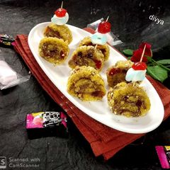 A picture of Mashmellow jelly rice crisps chocolate rolls.