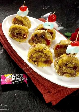A picture of Mashmellow jelly rice crisps chocolate rolls.