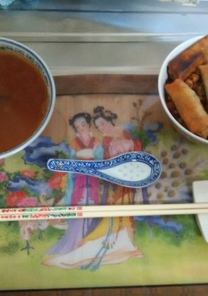 A picture of Japanese spicy salami sticks with roll up scrambled eggs.