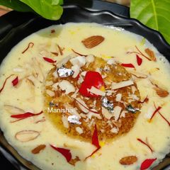 A picture of Instant Shahi Tukda with fresh cream.