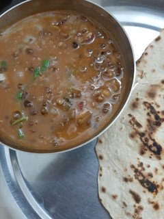 A picture of Dal makhni with chapati.