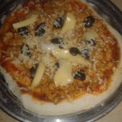 Chicken tikka pizza A picture of Chicken tikka pizza.