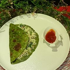 A picture of Palak Paneer Paratha.