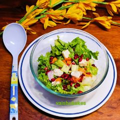 A picture of Veggies, fruits and Cheese Salad.