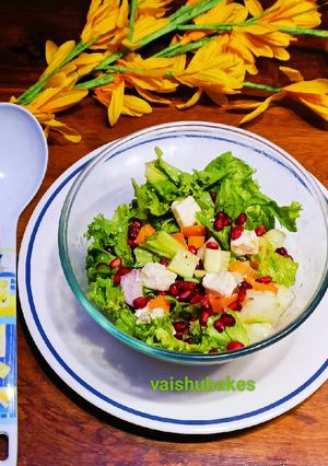 A picture of Veggies, fruits and Cheese Salad.
