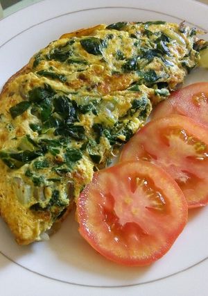 A picture of Spinach omelette(#AuthorMarathon).