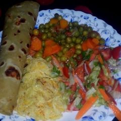 Chapati served with peas and veges A picture of Chapati served with peas and veges.