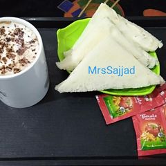 A picture of Chicken Sandwich with Hot Chocolate Coffee.
