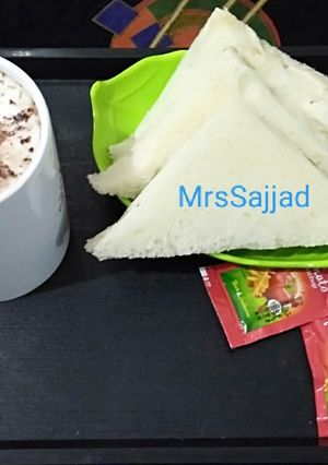 A picture of Chicken Sandwich with Hot Chocolate Coffee.