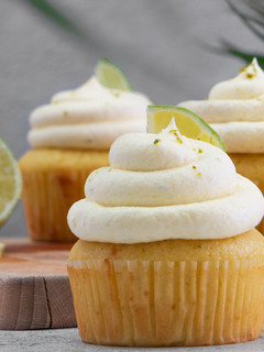 A picture of Margarita Cupcakes with Tequila Lime Cream Cheese Frosting.