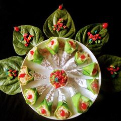 A picture of Paan Khili Petha (Betel Leaf Pancake stuffed with Rabri).