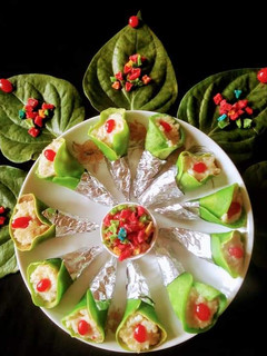 A picture of Paan Khili Petha (Betel Leaf Pancake stuffed with Rabri).