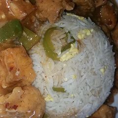 A picture of White Manchurian with egg fried rice.
