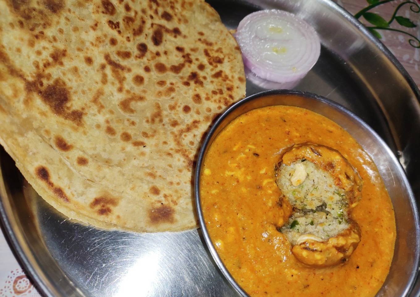 Paneer kofta with rich coconut and kaju gravy