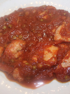Una foto de Pechuga de pollo con tomate