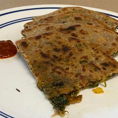 Junglee parathaThis flatbread is made out of all the green veggies with multigrain Flour A picture of Junglee parathaThis flatbread is made out of all the green veggies with multigrain Flour.