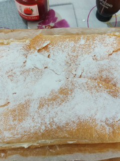 Una foto de Tarta de queso estilo milhojas